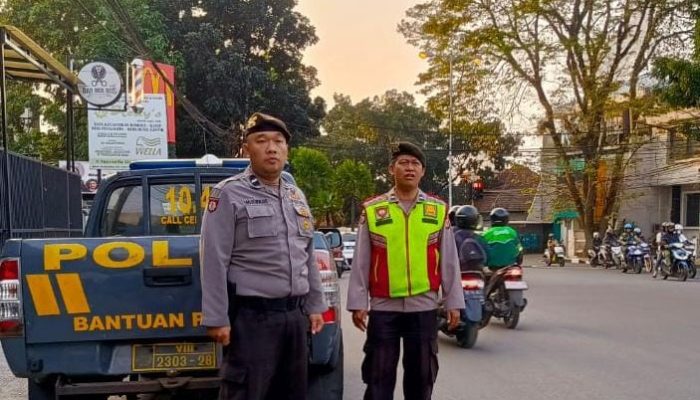 Unit Samapta Polsek Cicendo QR.18.4.B Laksanakan Pengawasan dan pengaturan Lalulintas Pagi