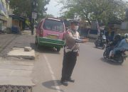 Unit Lantas Polsek Antapani Pimpin Pengaturan Lalulintas Siang Hari
