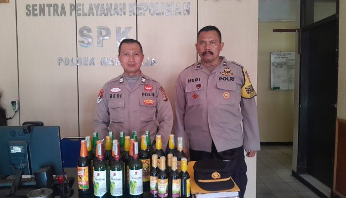 Polsek Wanaraja Amankan 24 Botol Miras dalam Operasi Cipta Kondusif