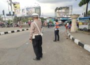 Personel Unit Lantas Polsek Babakan Ciparay Laksanakan Pengaturan Arus Lalin Dibeberapa titik rawan kemacetan sore Hari