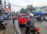 Personel Unit Lantas Polsek Babakan Ciparay Lakukan Pengaturan Arus Lalulintas Pagi Hari