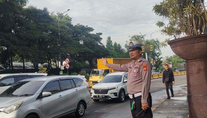 Usai pengamanan TPS,Anggota lantas polsek Bandung Kidul Kembali Pengaturan Lalu Lintas