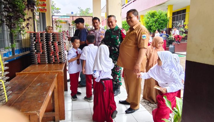 Polsek Tarogong Kidul Monitoring Program Makan Bergizi Gratis untuk Anak-Anak di Desa Haurpanggun