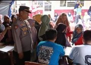 Kapolsek Malausma Dampingi Pengobatan Gratis Warga Terdampak Bencana di Desa Sukadana